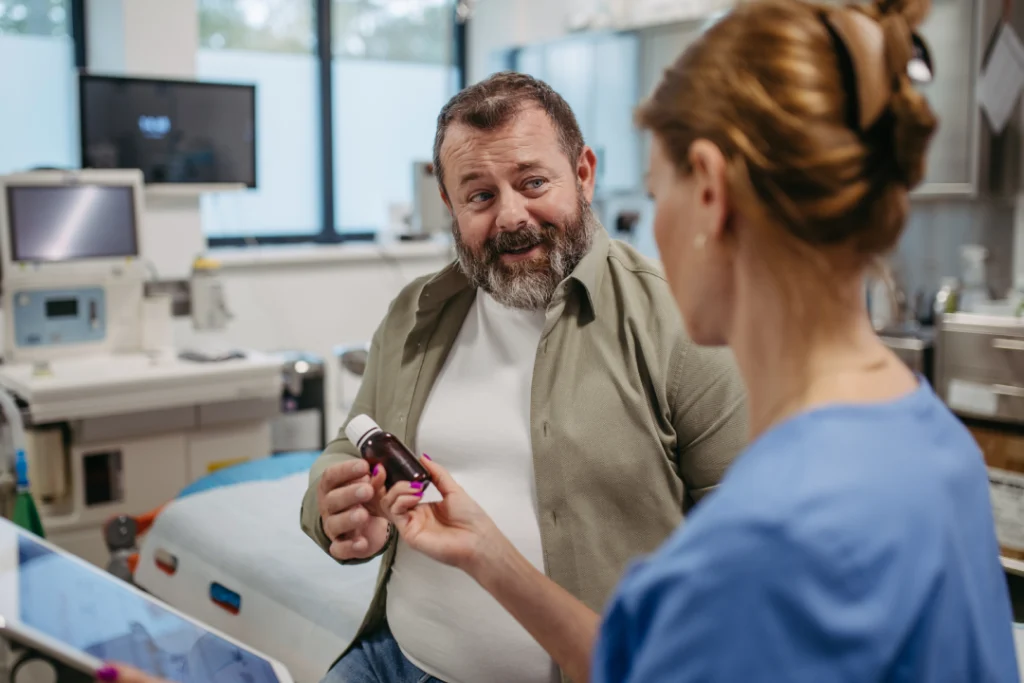 A patient discussing treatment options with a doctor during a Semaglutide consultation.